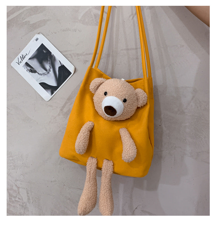 Canvas Shoulder Bag with Lamb Fur Bear Ornament