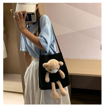 Canvas Shoulder Bag with Lamb Fur Bear Ornament